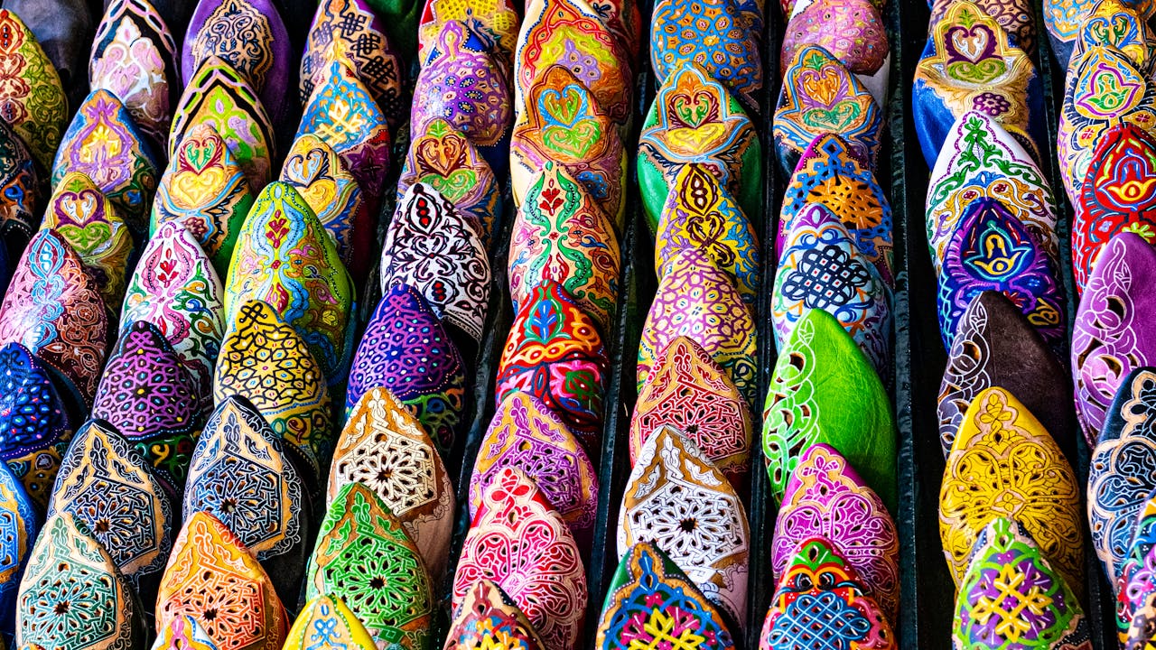 Vibrant handcrafted Moroccan slippers on display in Marrakesh, showcasing traditional artistry.